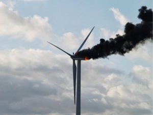 Two-Engineers-Hugging-Atop-A-Burning-Turbine-Before-They-Died-600x451